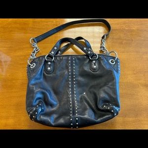 Black leather Michael Kors purse with silver studs, silver/black strap